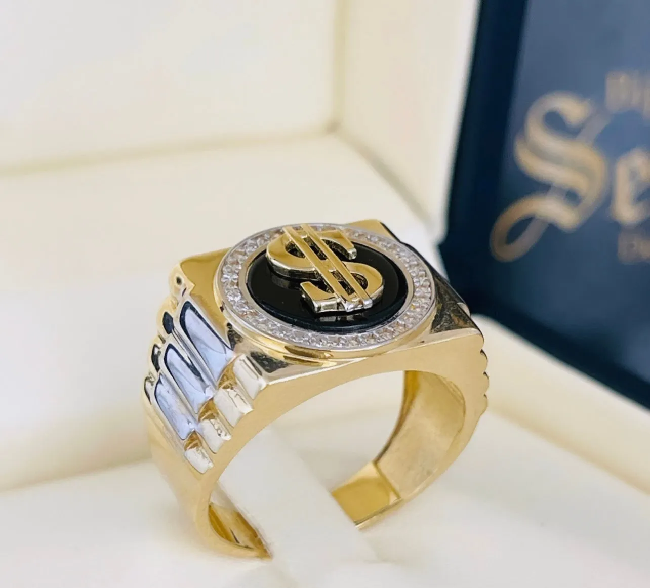 Dollar sign ring